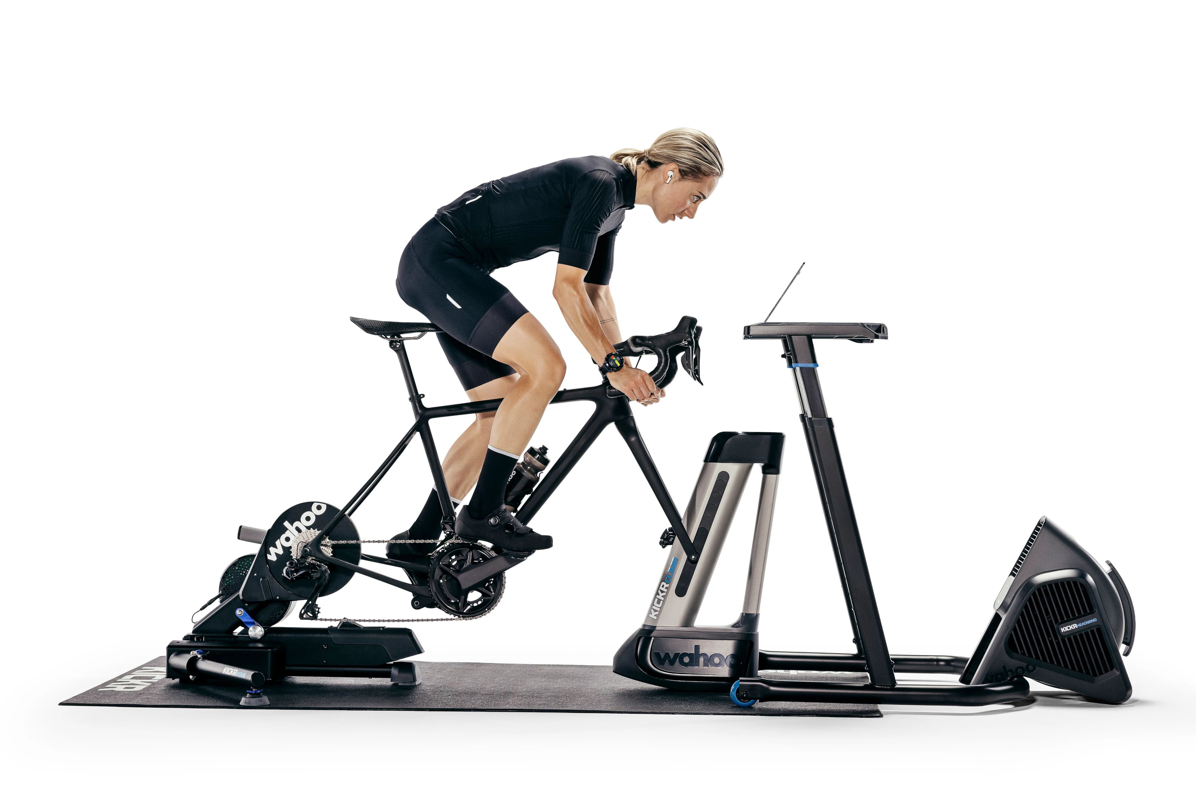 woman riding Wahoo Kickr Move