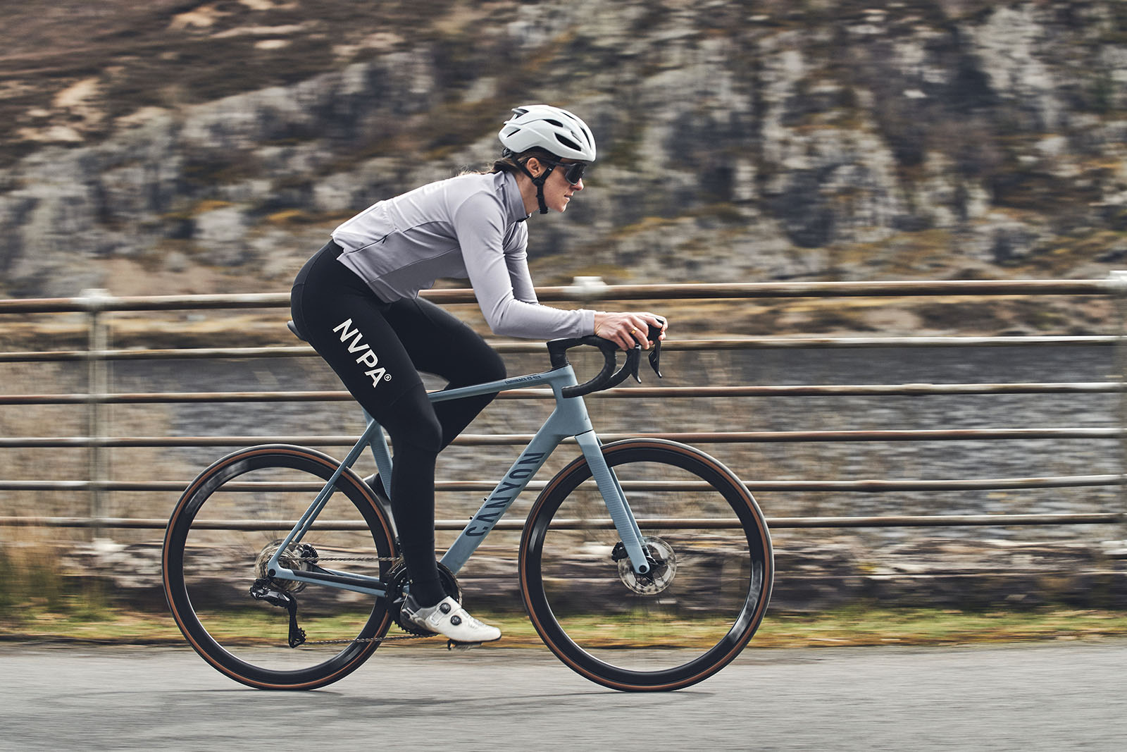 Male cycist in grey top riding the Canyon Endurace CF SLX 8 Di2 road bike