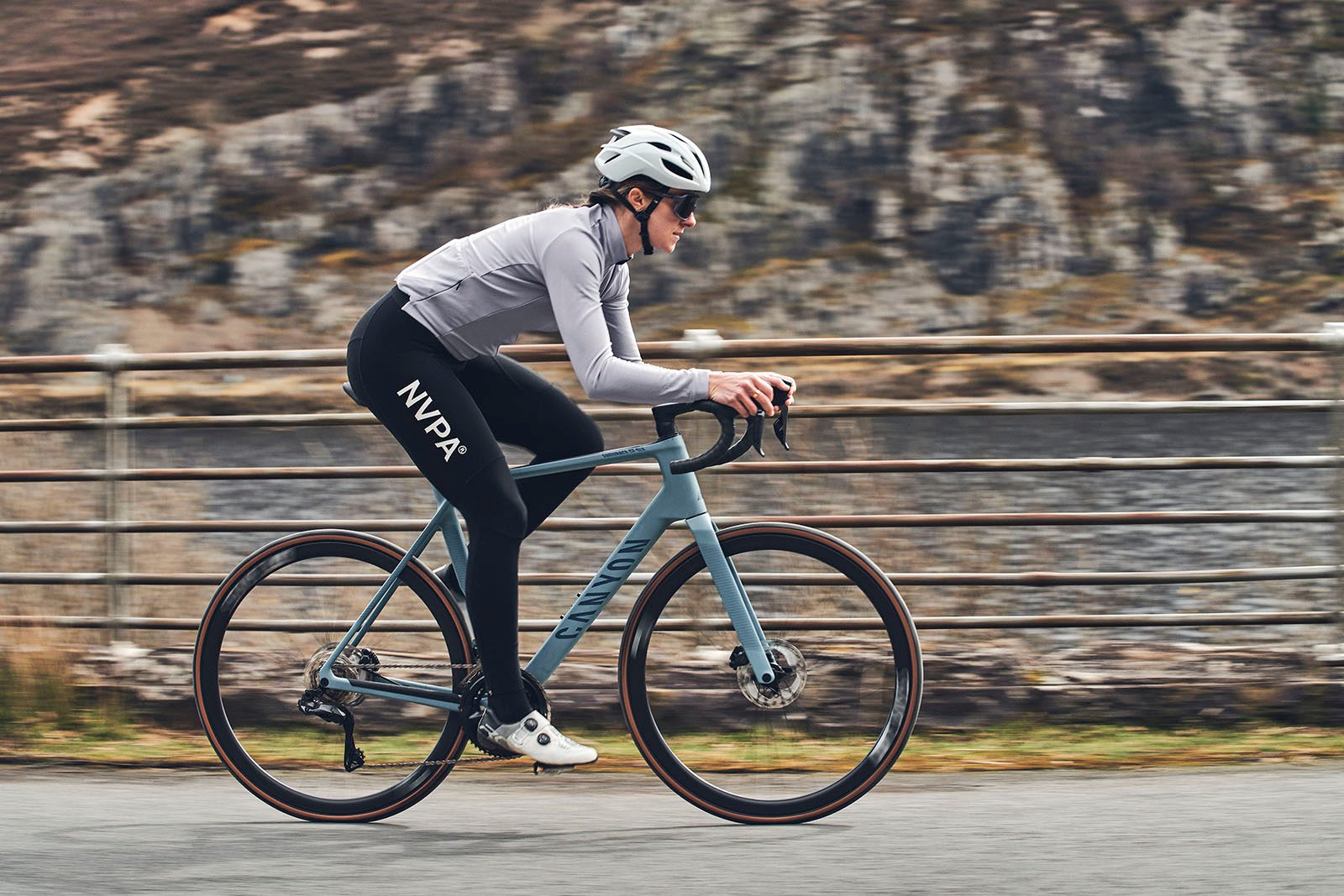 Male cycist in grey top riding the Canyon Endurace CF SLX 8 Di2 road bike