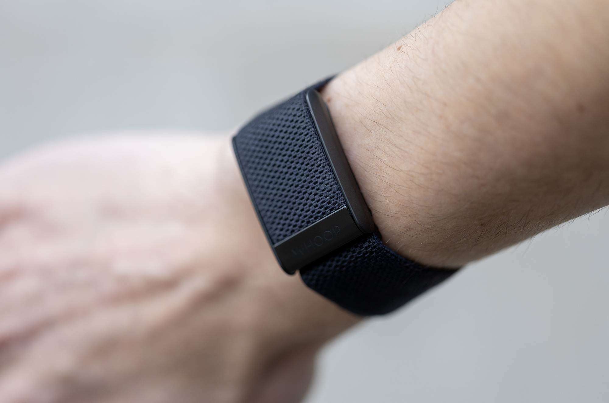 Whoop 4.0 Band on wrist.