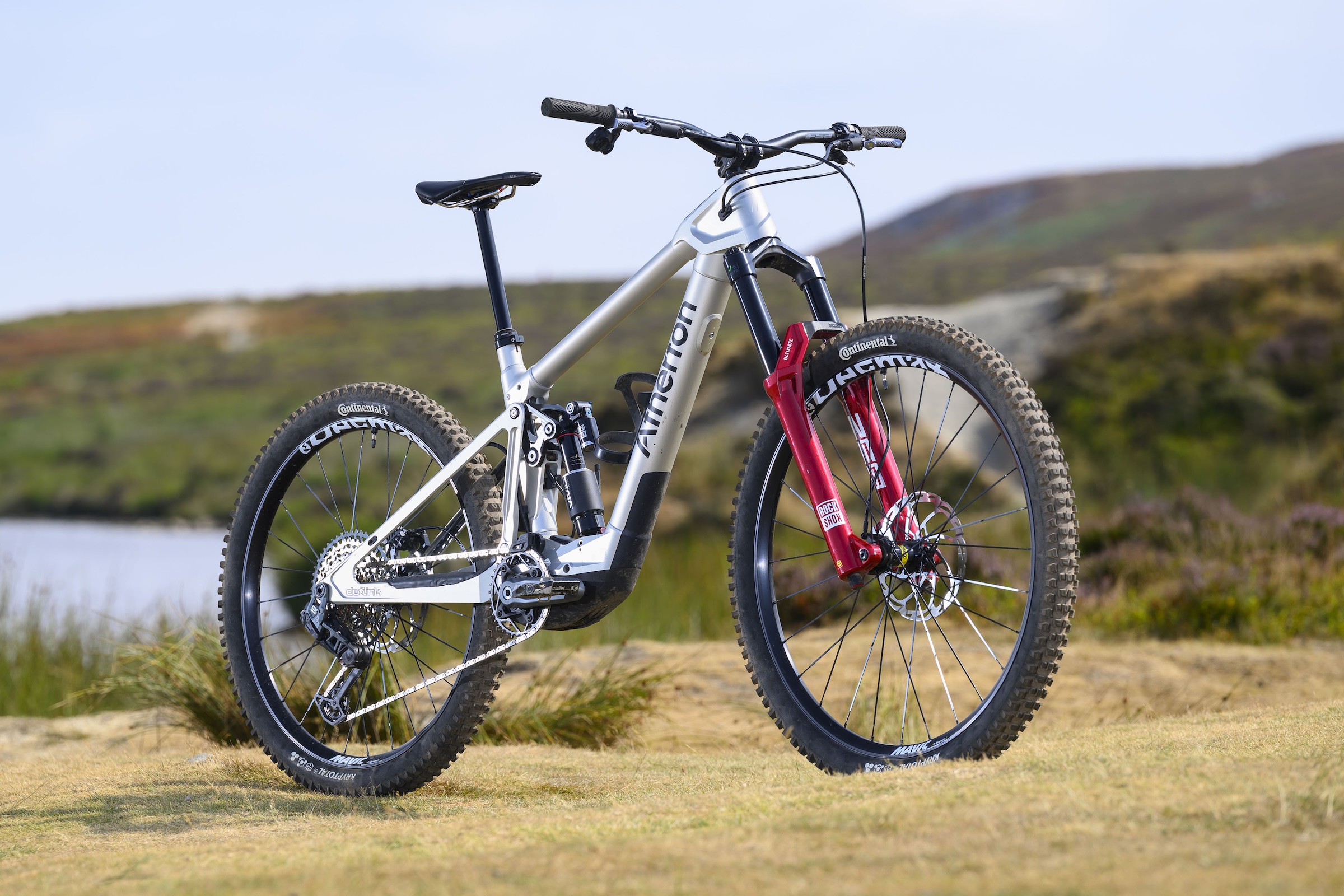 Silver Atherton S.170E.2 electric mountain bike shown in a three-quarter view beside open moorland