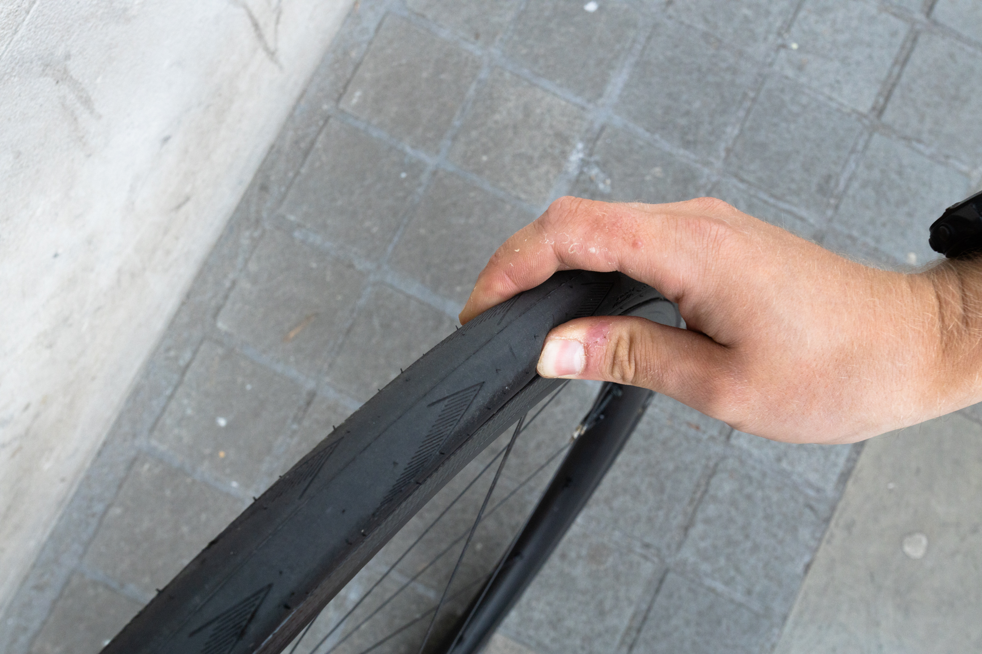 How to pump up a bicycle tyre step-by-step guide (12 of 12) We'd recommend checking your tyre pressure with a pump or gauge but you can pinch the tyre to check if you're in the rough ballpark.