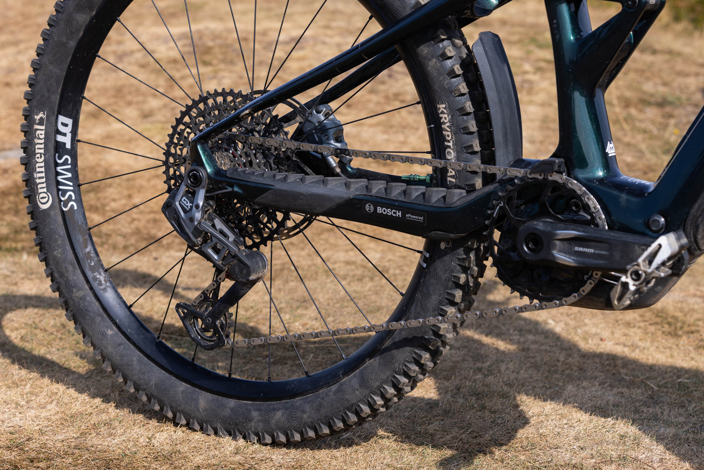 Close-up of the Merida Lithos 8000 rear wheel, SRAM drivetrain, DT Swiss wheel and Continental Kryptotal tyre