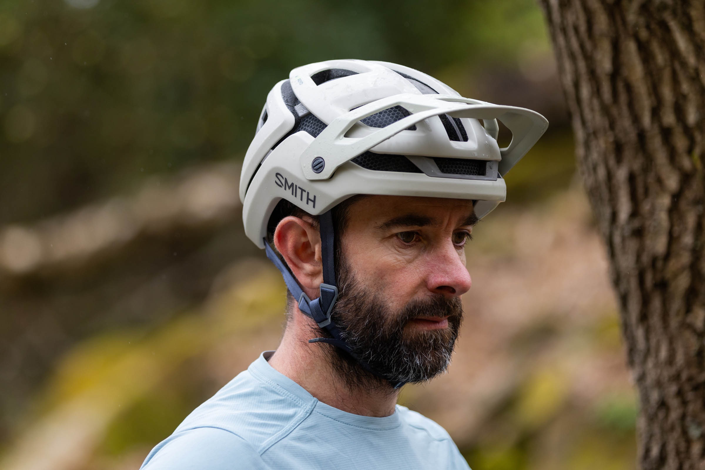 Man wearing cream coloured Smith Forefront 3 trail helmet.