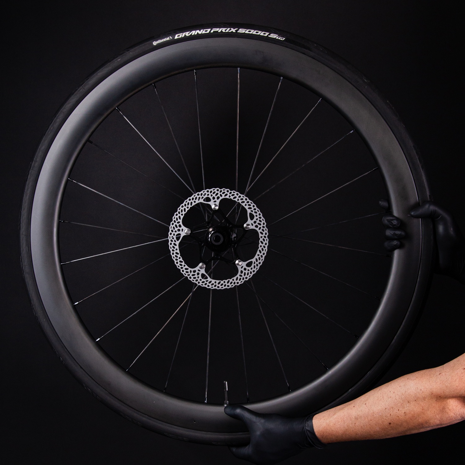 Absolute Black Raven rotor on wheel.