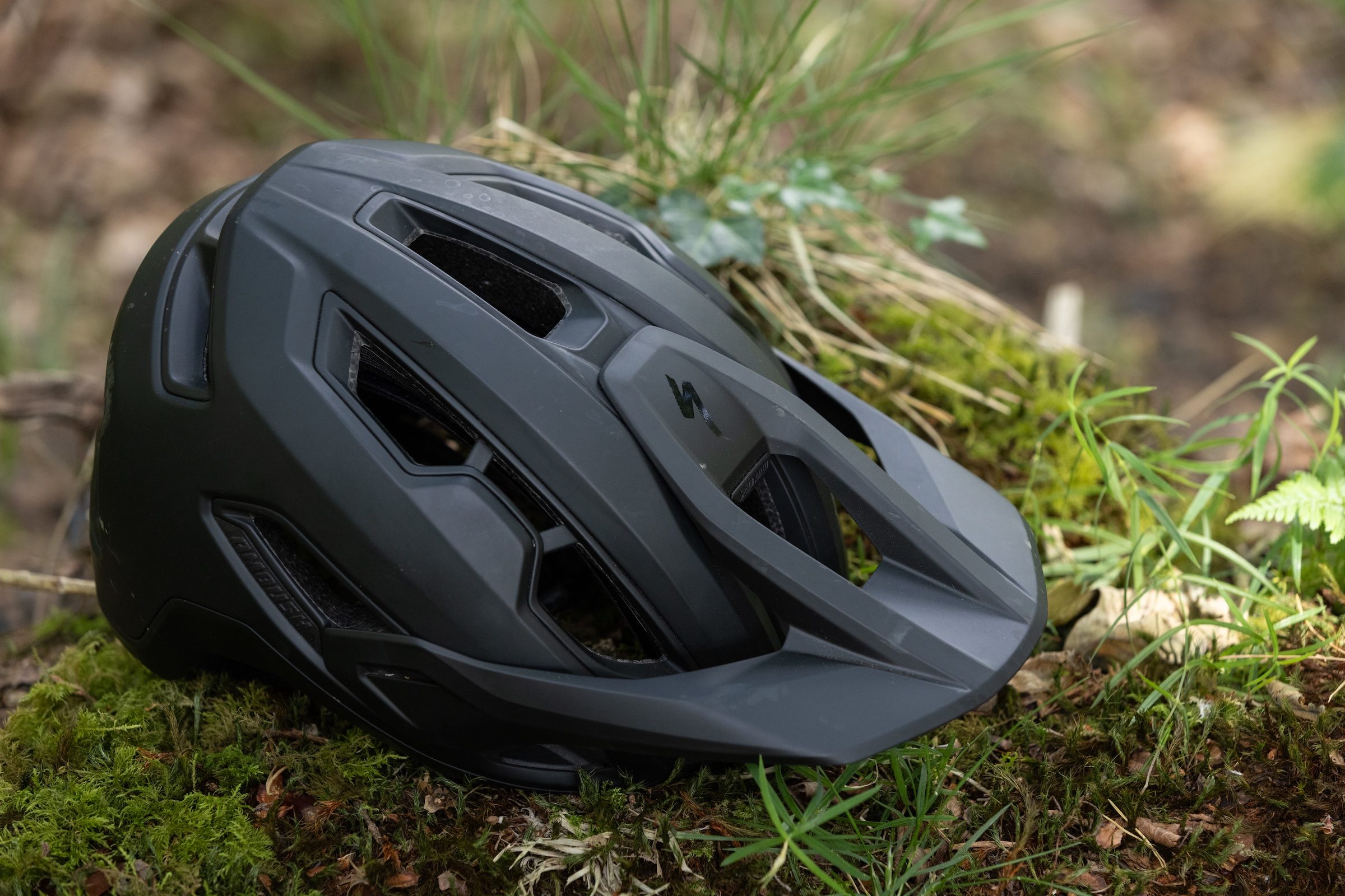 Close-up of the front quarter of the Specialized Ambush 3 mountain bike helmet.