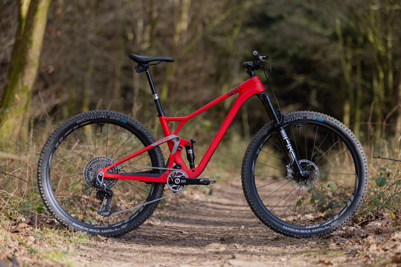 Pack shot of the Spot Ryve 115 6-Star AXS full suspension mountain bike