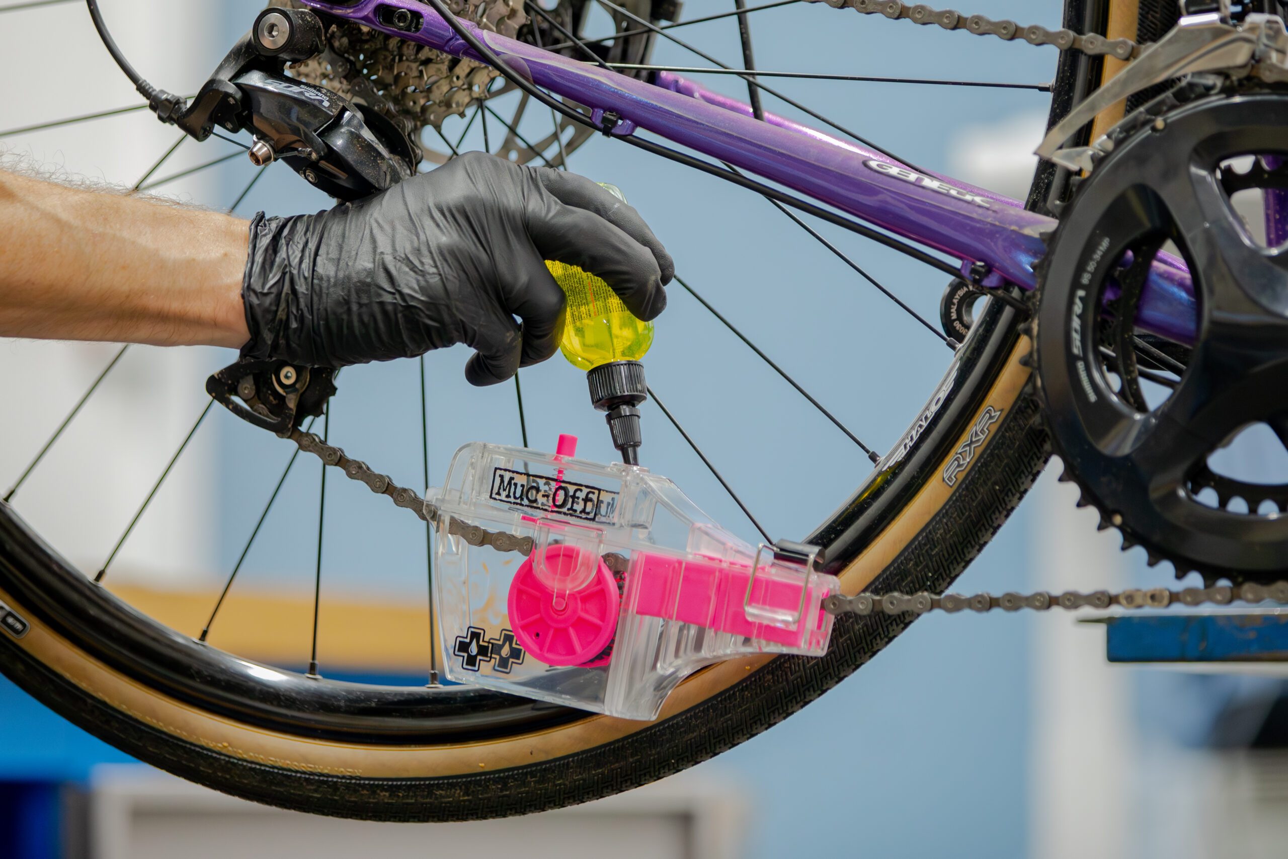 Will Soffe cleaning a road bike chain