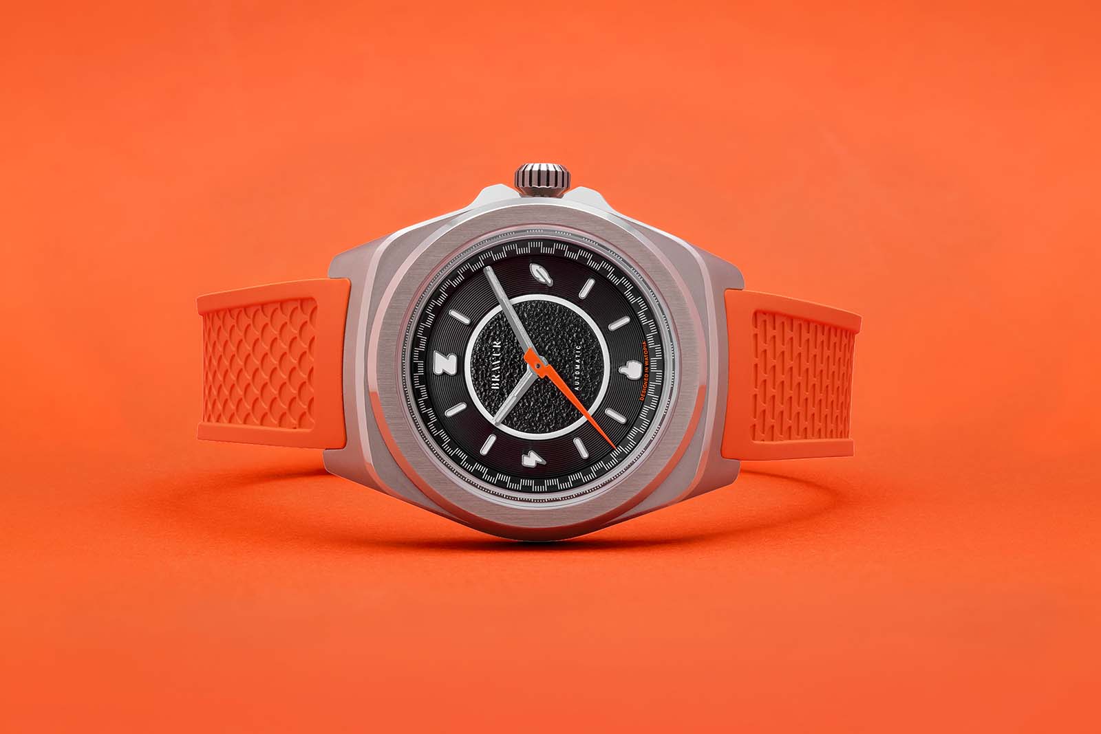 Zwift x Bravur watch with orange strap.