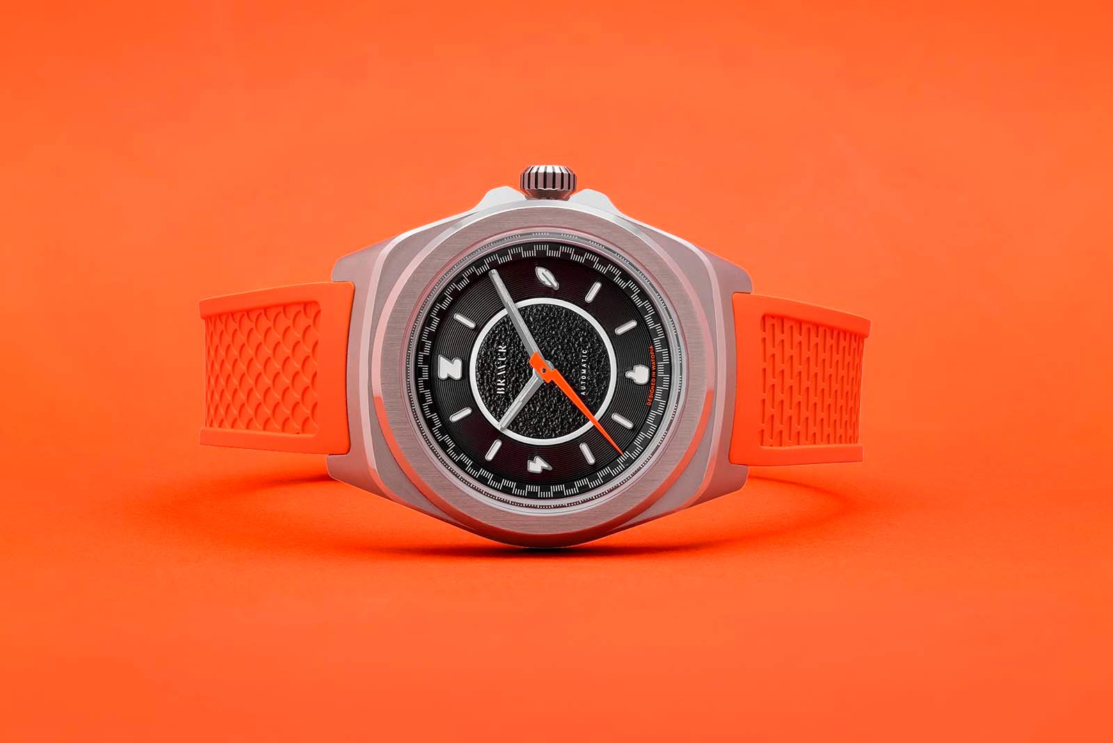 Zwift x Bravur watch with orange strap.
