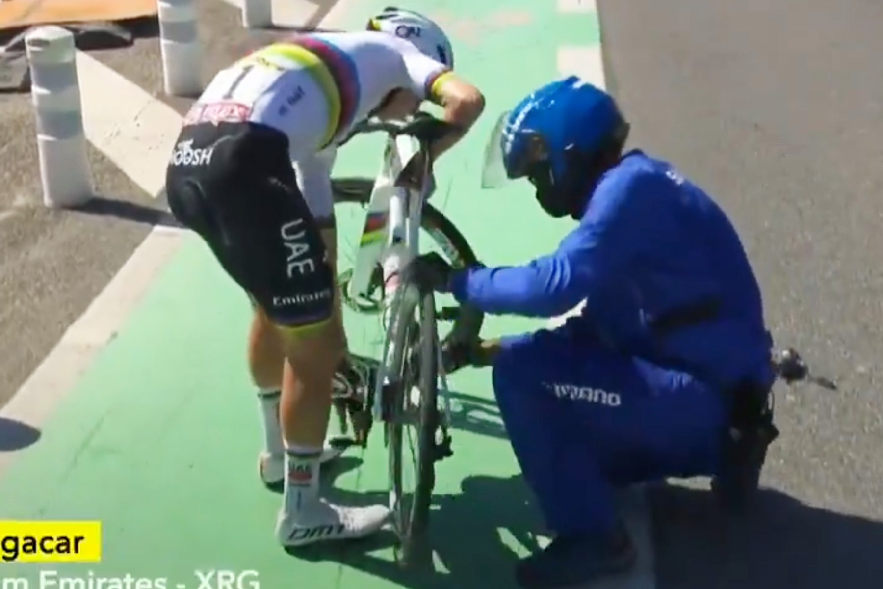 Tadej Pogačar being helped by Shimano neutral service at the 2025 Tour de France