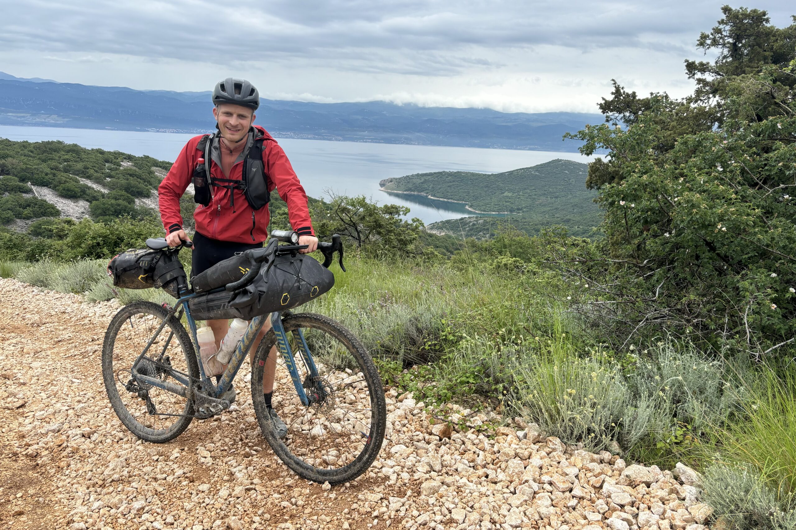 Oscar Huckle standing with Niner RLT 9 RDO gravel bike 