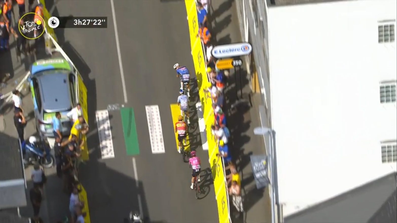 A L'Équipe car after crashing into the finish line barriers during stage 9 of the 2026 Tour de France