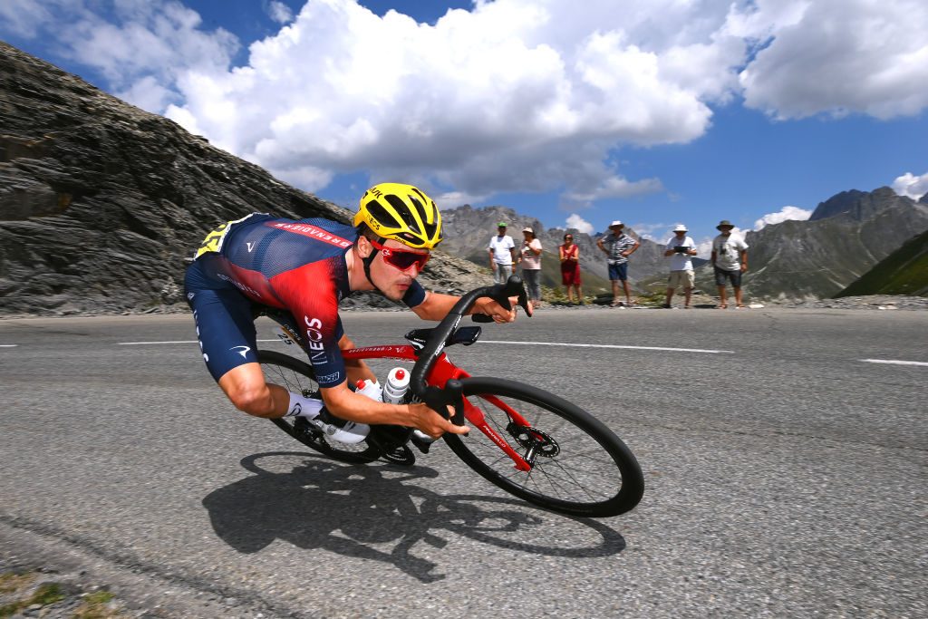 Tom Pidcock racing on Alpe d'Huez at Tour de France.