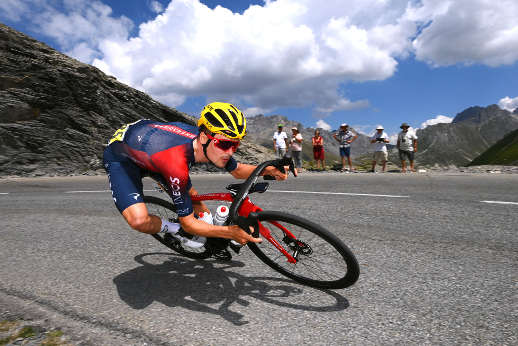 Tom Pidcock racing on Alpe d'Huez at Tour de France.