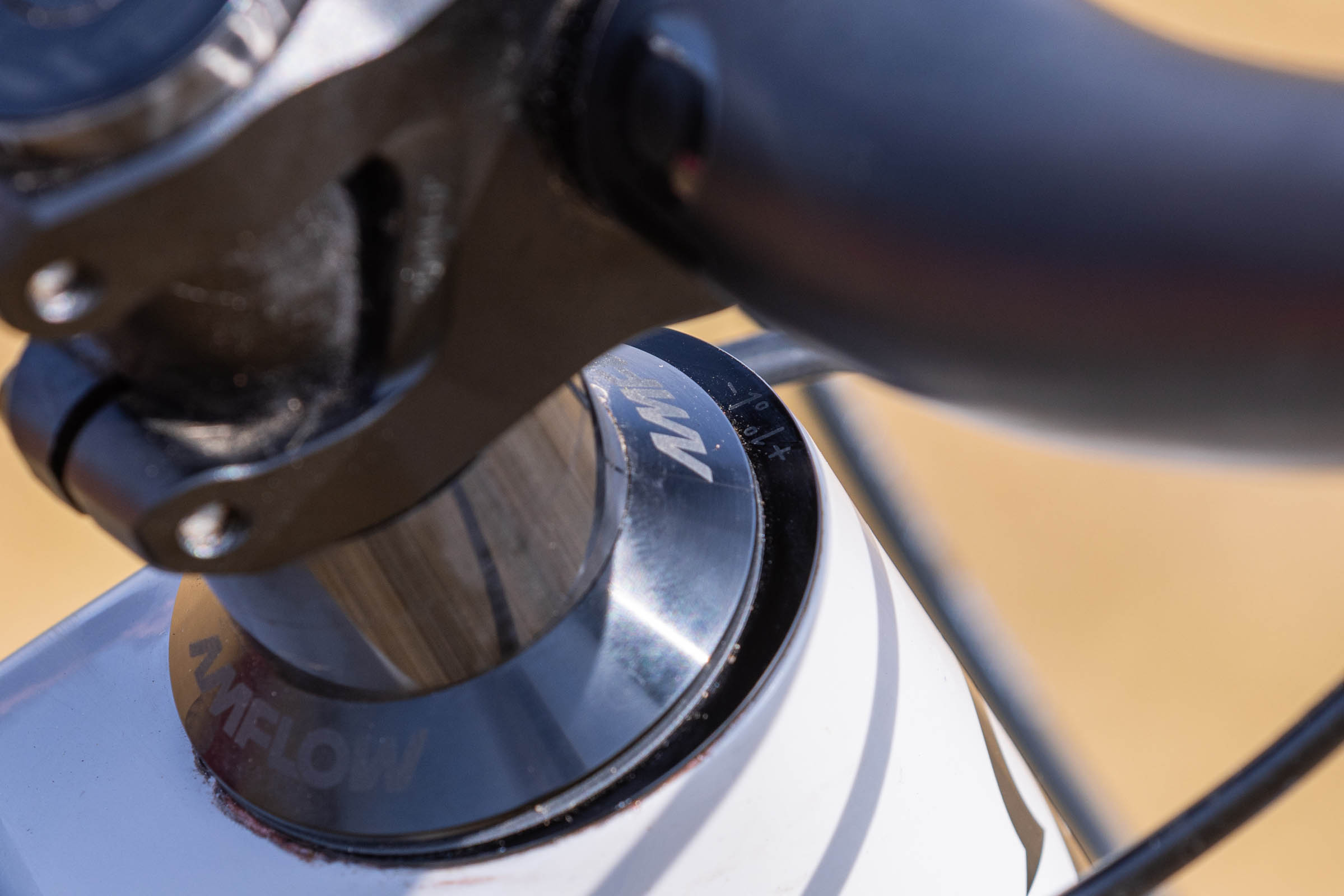 Close-up of the Amflow PX Carbon Pro headset showing its adjustable geometry hardware