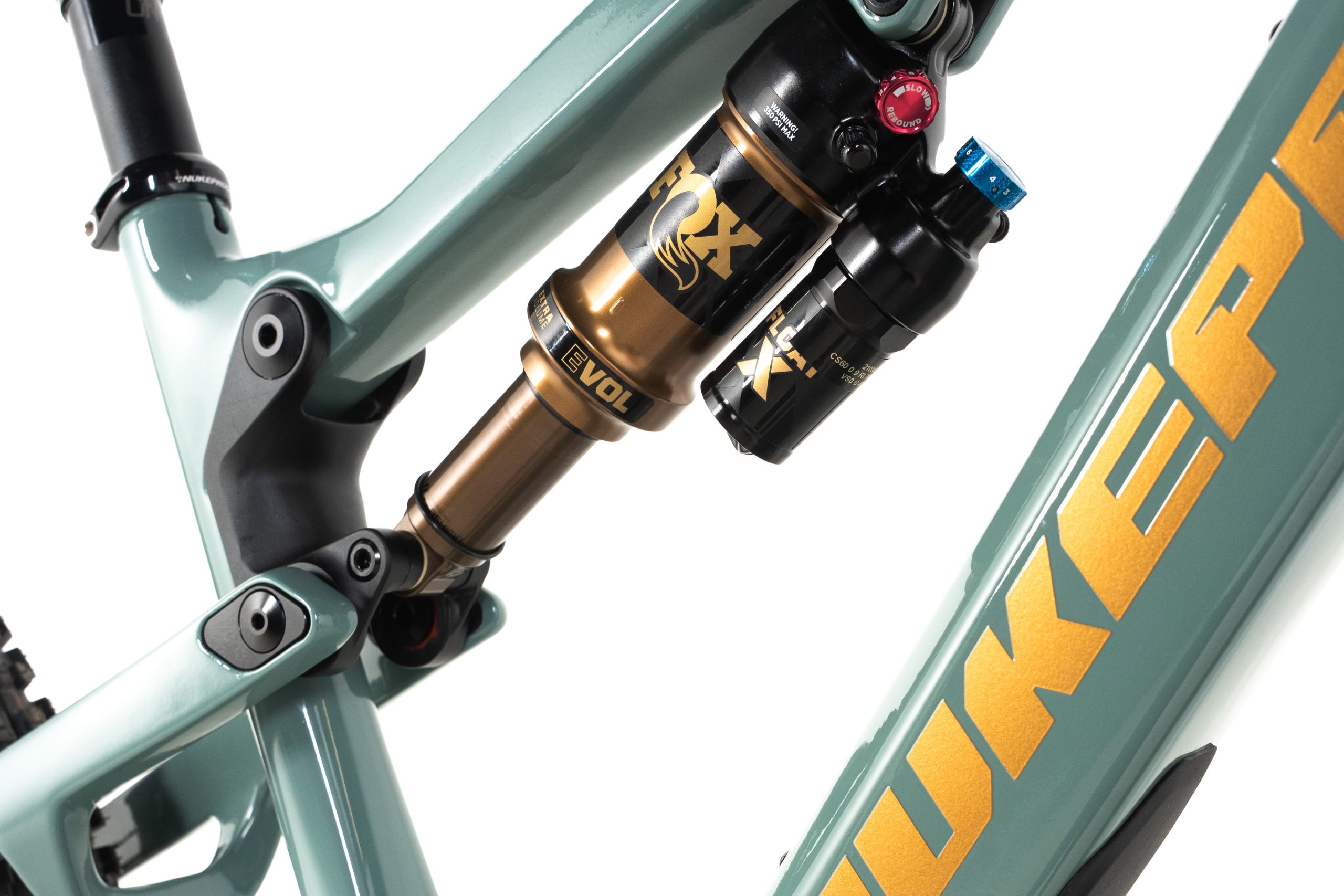 Close-up of the Nukeproof Kilowatt’s Fox Float X Factory shock and single-piece suspension rocker.
