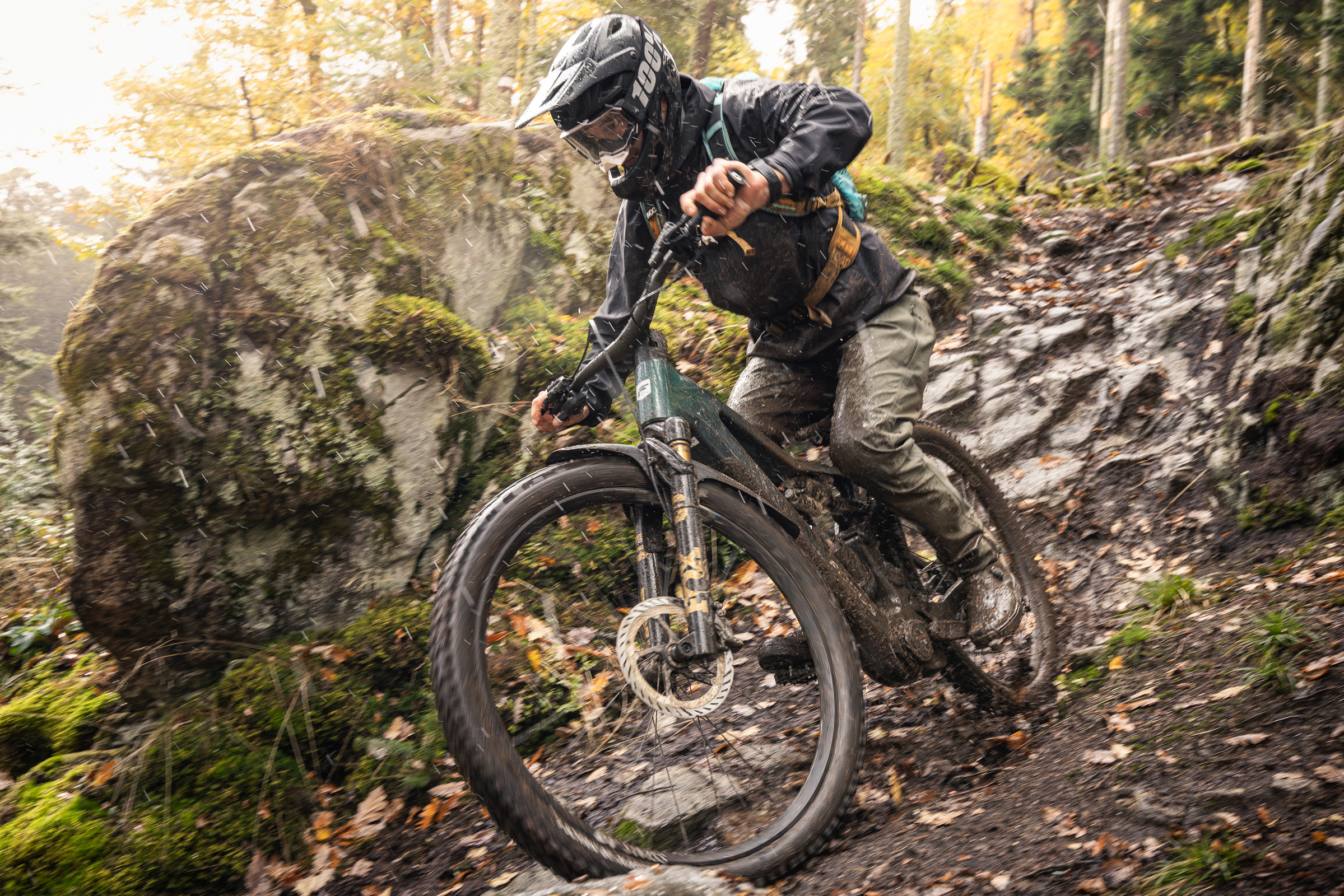 Focus Bikes Jam2 NEXT electric mountain bike ridden by male mountain biker in muddy conditions