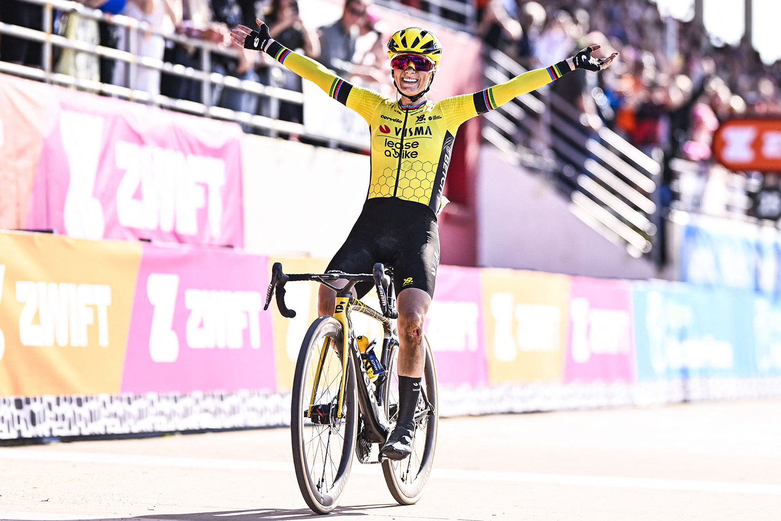 Pauline Ferrand Prevot celebrating as she wins the 2025 Paris–Roubaix Femmes.
