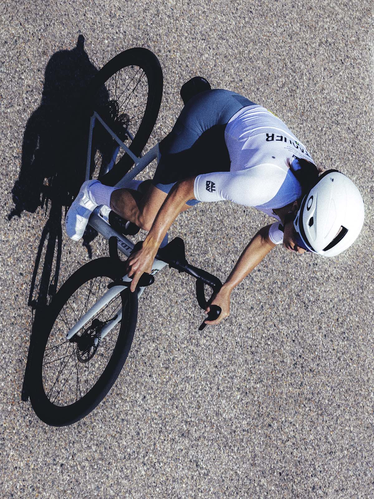 Person riding bike with Campagnolo Zonda wheels.