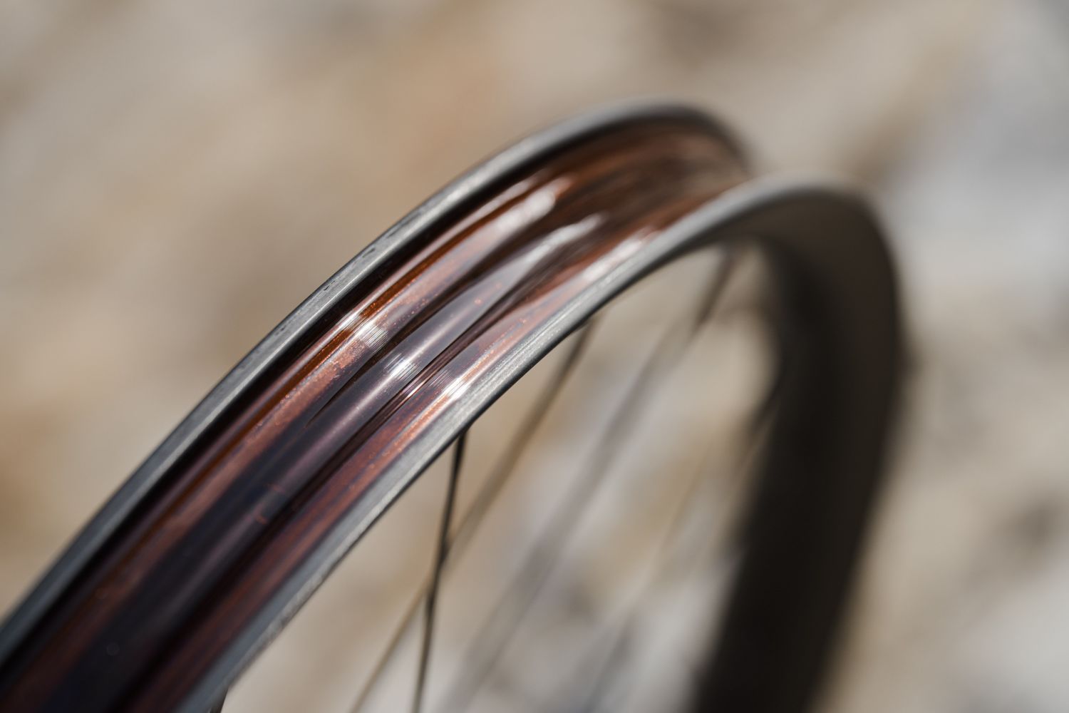 Close up of the Cadex Max XC hookless carbon rim showing its wide reinforced rim edges.