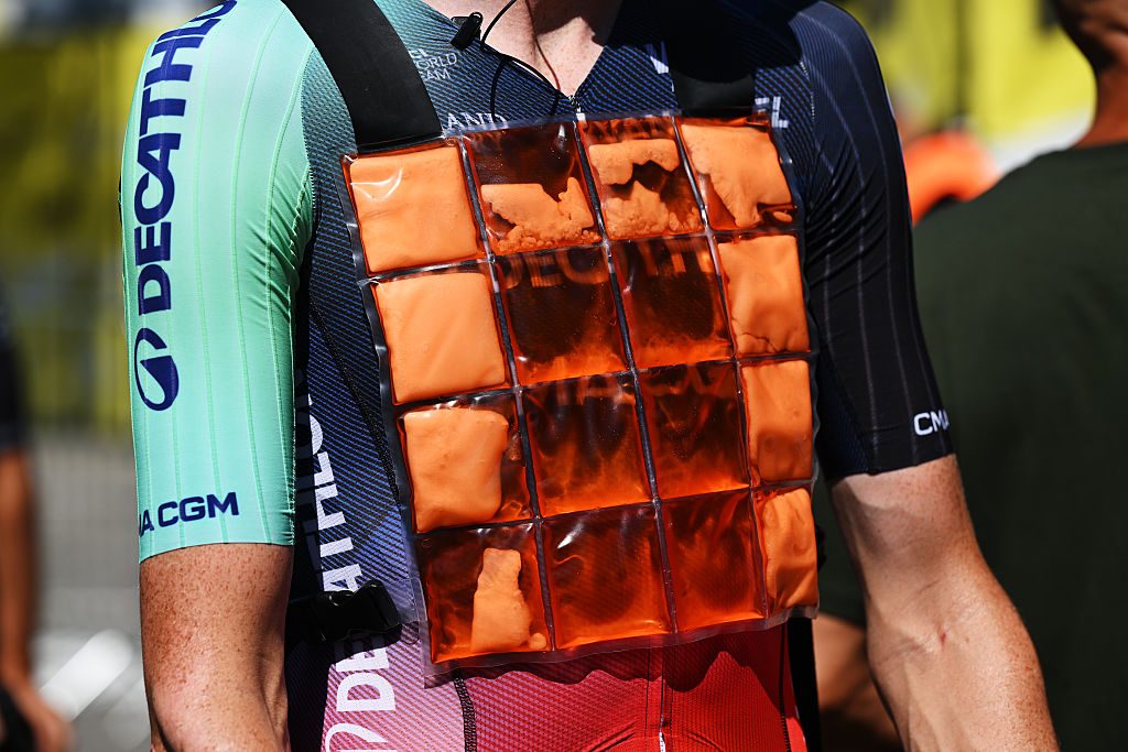 Riders use ice vests to stay cool before hot stages.