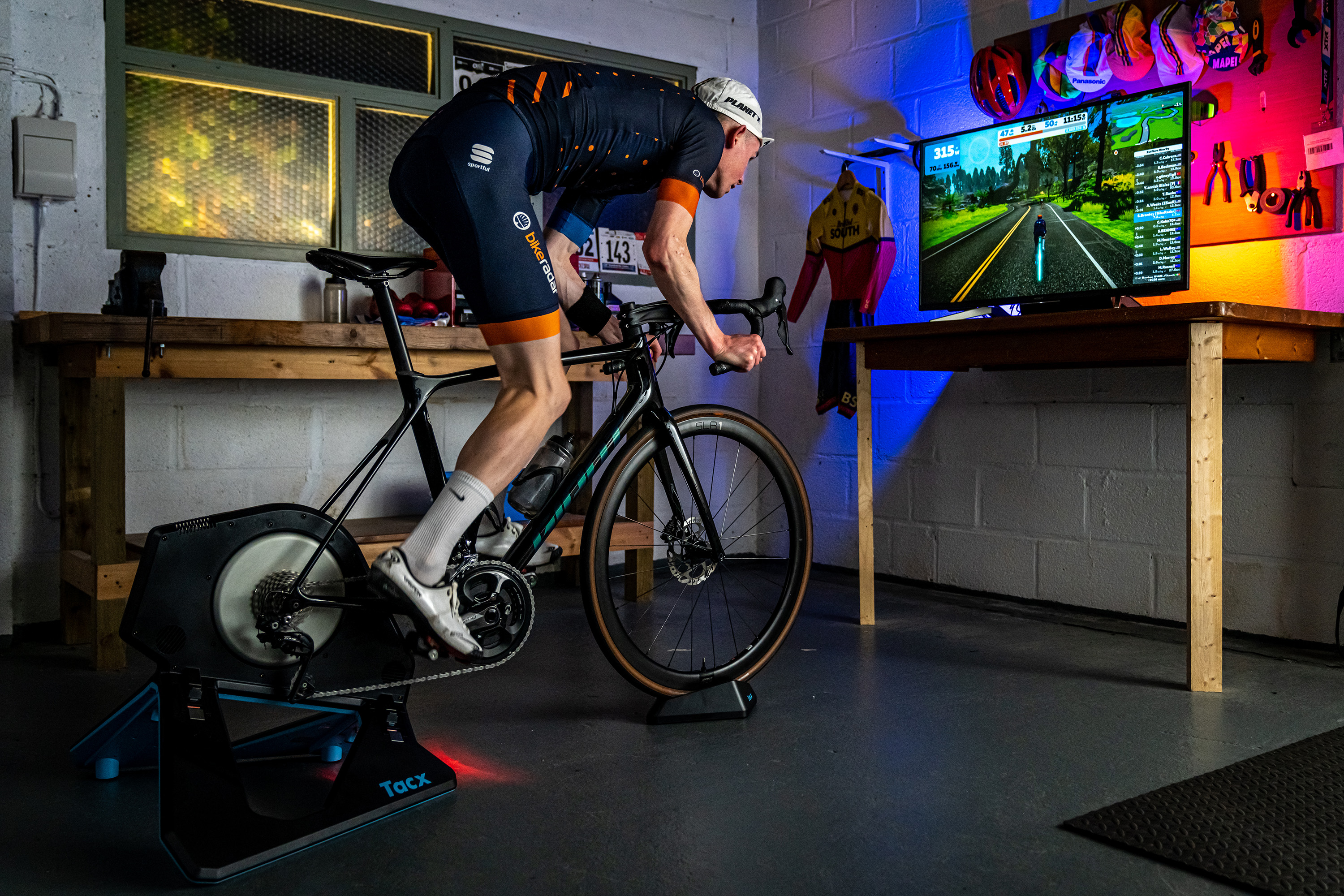Best smart trainer 2022 Man riding a smart trainer