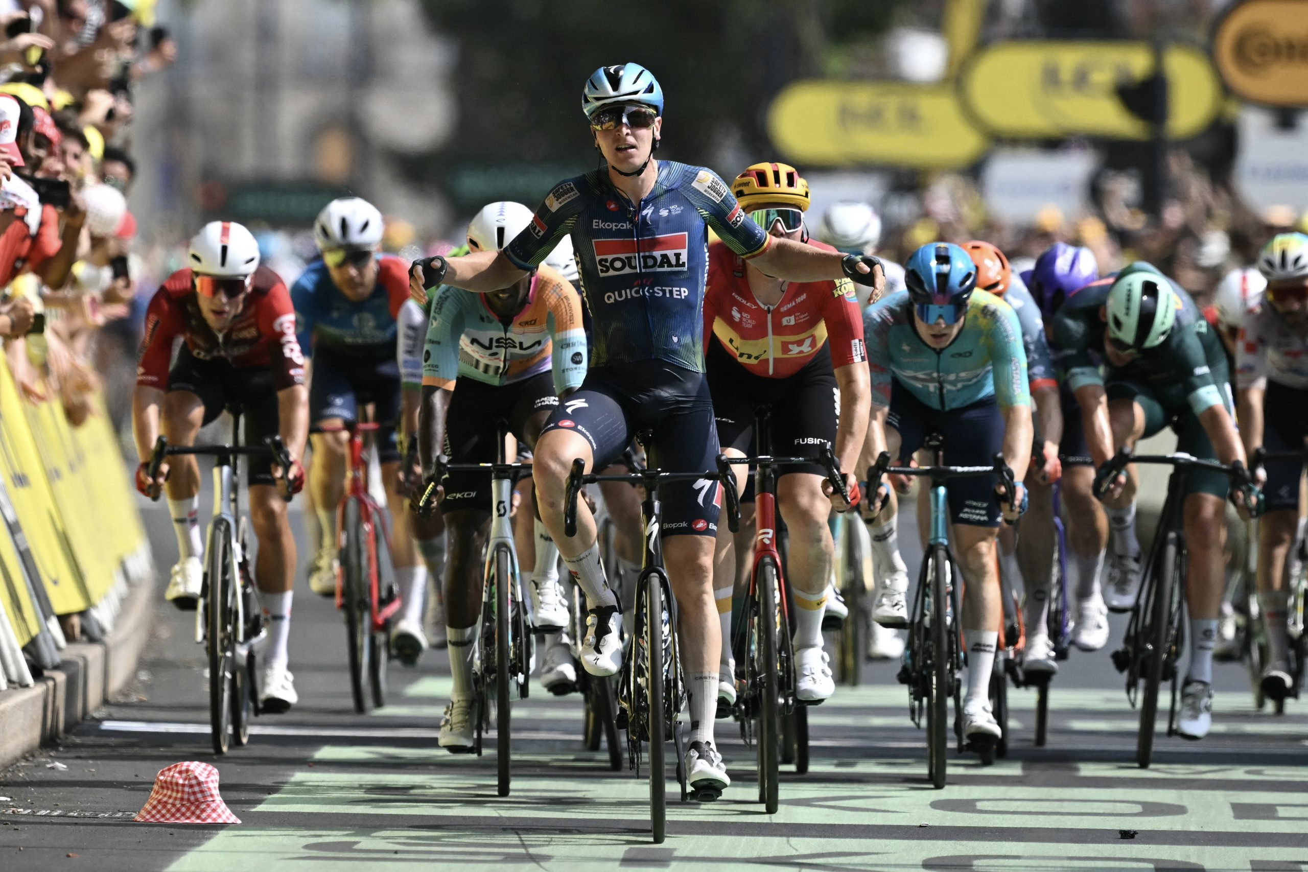 Soudal Quick-Step team's Belgian rider Tim Merlier cycles to the finish line to win the 7th stage of the 113th edition of the Tour de France cycling race, 175 km between Hagetmau and Bordeaux in southwestern France, on July 10, 2026. (Photo by Jeff PACHOUD / AFP via Getty Images)