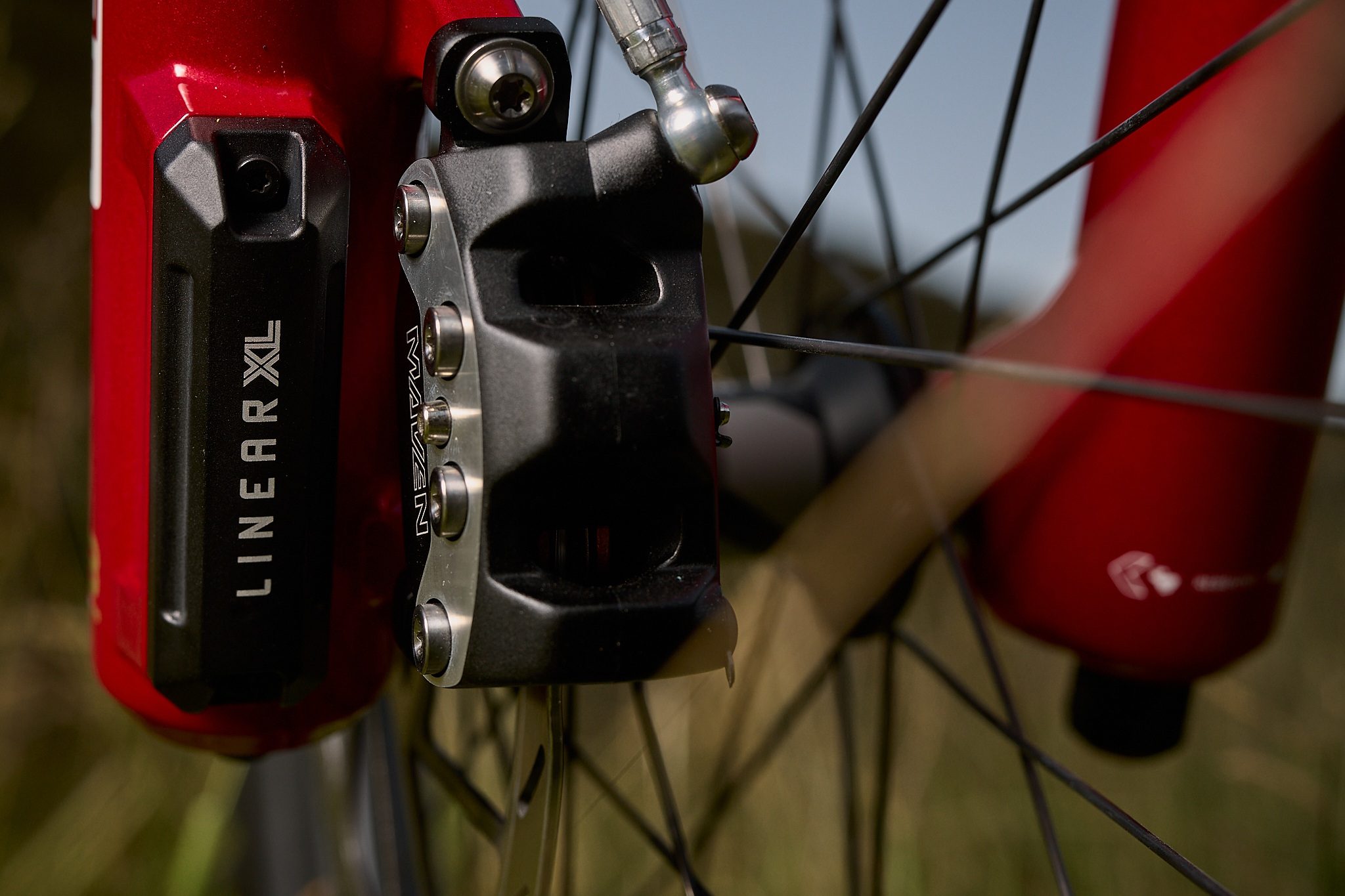Close up shot of the new RockShox LinearXL AirAnnex - a bulge on the lower leg casting of the new RockShox Boxxer fork.