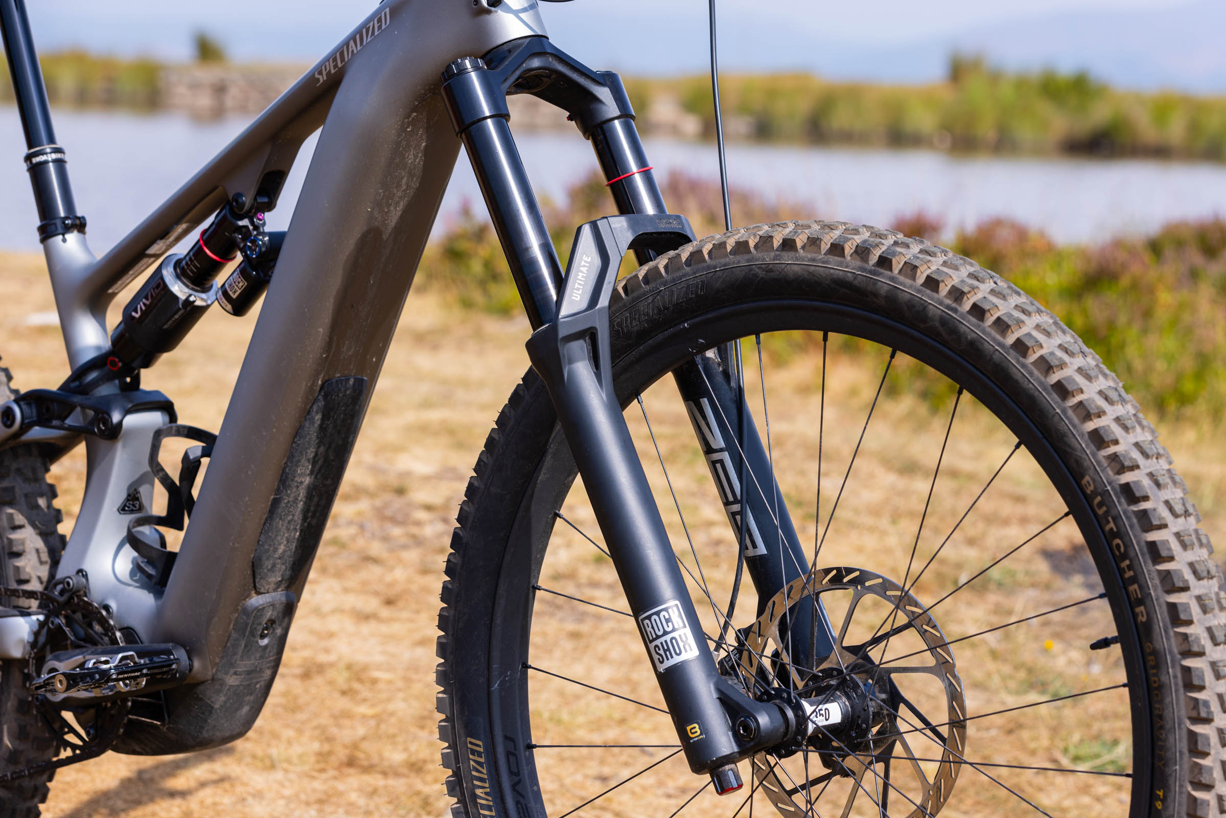 Close-up of the Specialized Levo 4 EVO Pro’s RockShox Zeb Ultimate fork, front wheel and frame