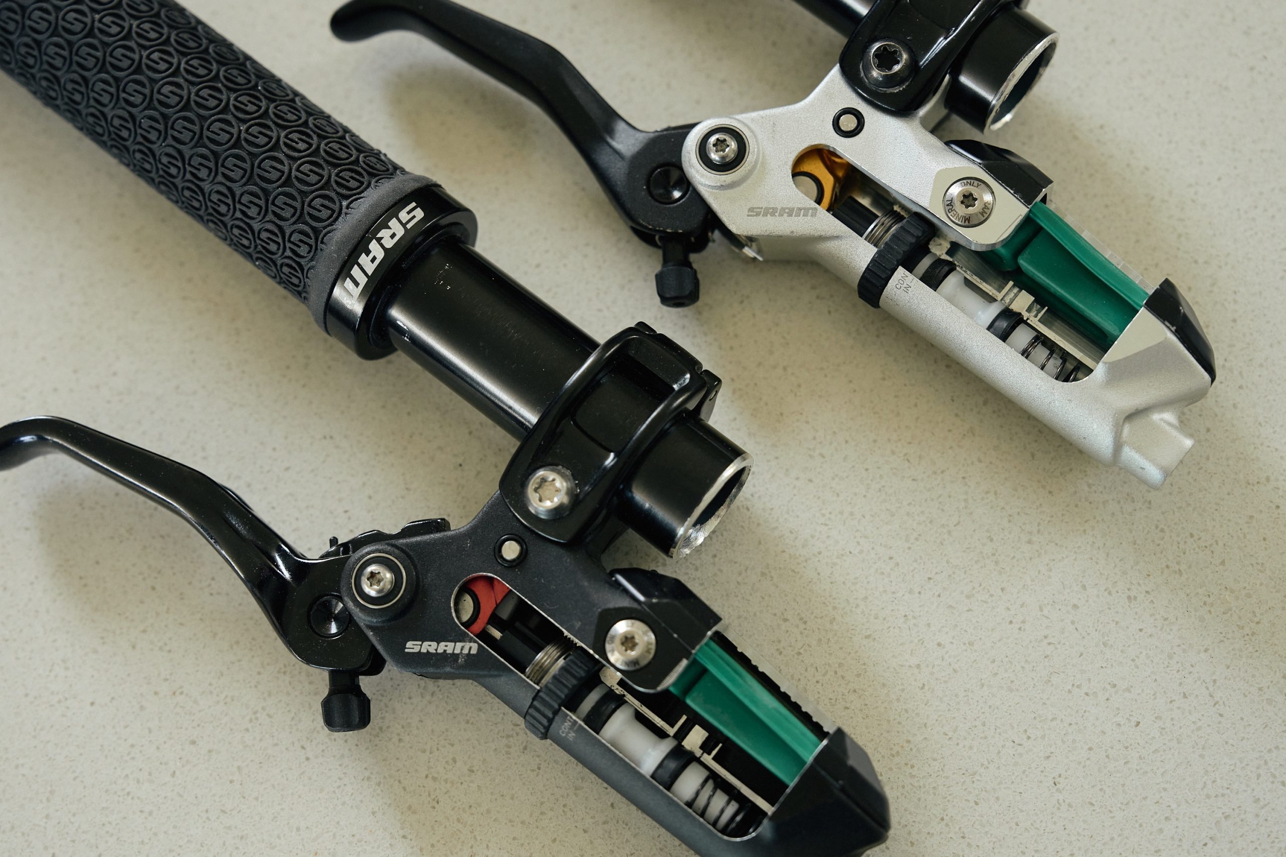 Maven cutaway comparison levers, showing lever internals and updated SwingLink cams.
