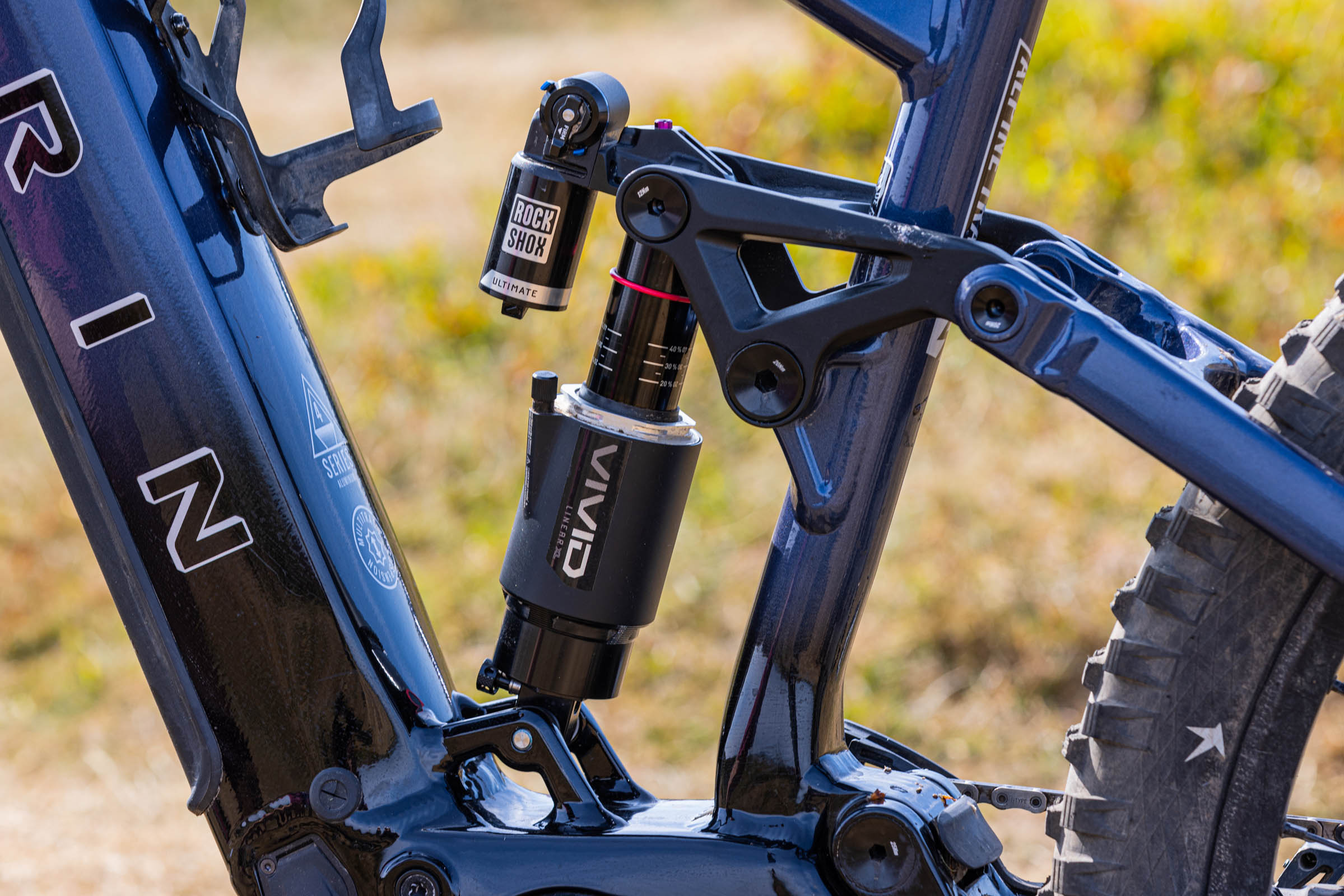 Close-up of the RockShox Vivid Air Ultimate rear shock and suspension linkage on the Marin Alpine Trail E XR