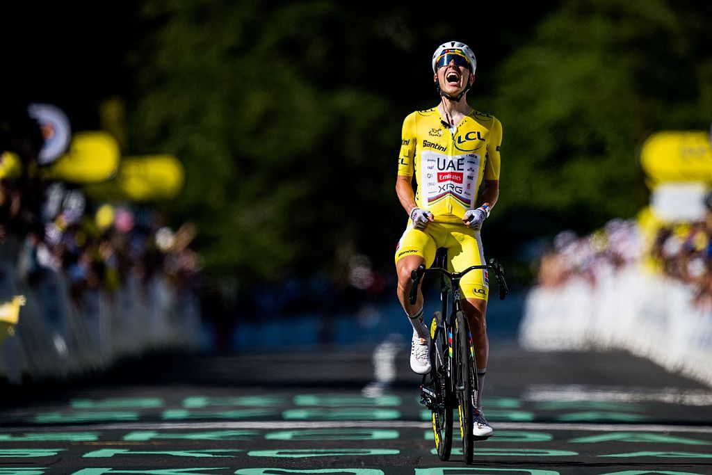 Slovenian Tadej Pogacar of UAE Team Emirates XRG celebrates as he crosses the finish line to win the stage 10 of the 2026 Tour de France.
