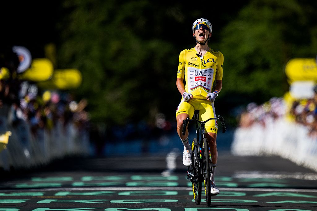 Slovenian Tadej Pogacar of UAE Team Emirates XRG celebrates as he crosses the finish line to win the stage 10 of the 2026 Tour de France.