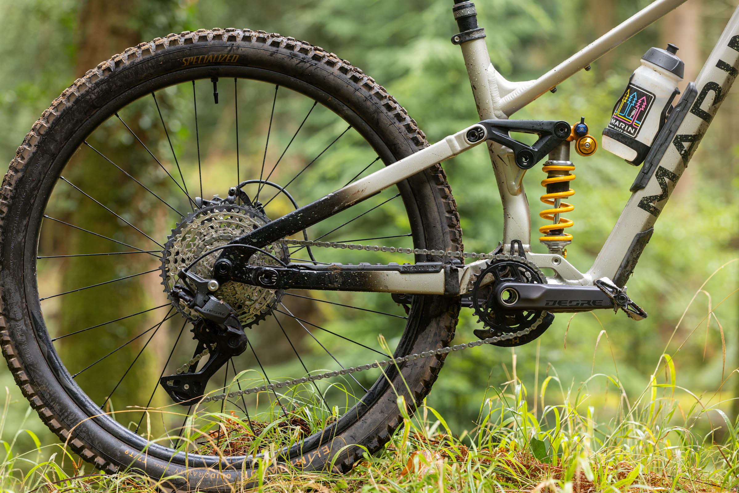 Shimano Deore M7200 drivetrain fitted to a Marin full-suspension mountain bike, showing the rear derailleur, cassette, chain and crankset.