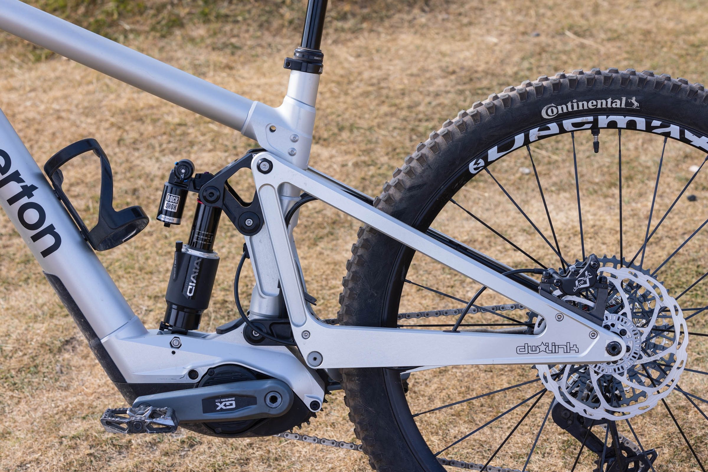 Close-up of the Atherton S.170E.2’s DW4 suspension linkage, rear shock and mixed-wheel rear end