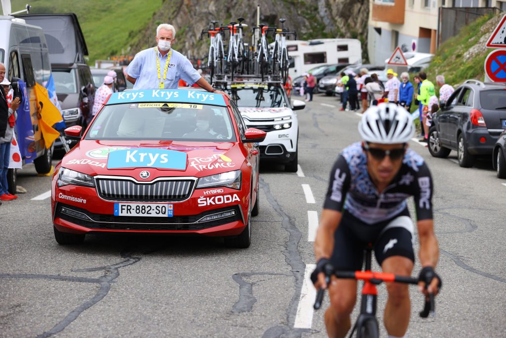 LUZ ARDIDEN, FRANCE - JULY 15: UCI Commissaire Jury & Sergio Henao of Colombia and Team Qhubeka NextHash during the 108th Tour de France 2021, Stage 18 a 129,7km stage from Pau to Luz Ardiden 1715m / @LeTour / #TDF2021 / on July 15, 2021 in Luz Ardiden, France.