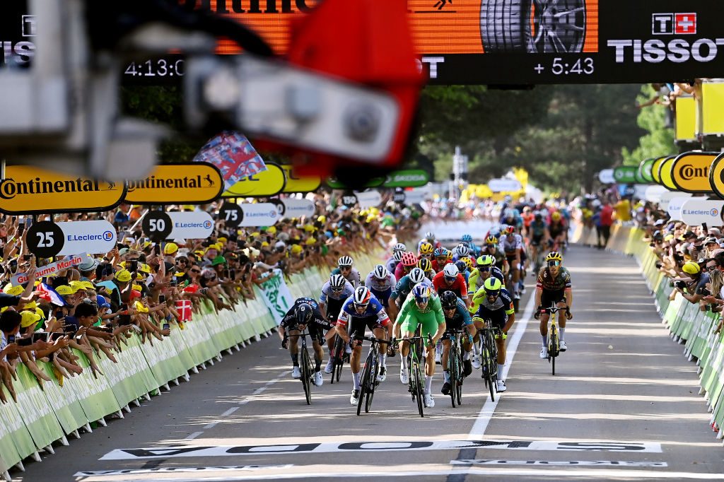 SAINT-ETIENNE, FRANCE - JULY 15: (L-R) Alberto Dainese of Italy and Team DSM, Florian Senechal of France and Quick-Step - Alpha Vinyl Team, Wout Van Aert of Belgium and Team Jumbo - Visma - Green Points Jersey, Luca Mozzato of Italy and Team B&B Hotels P/B KTM and Andrea Pasqualon of Italy and Team Intermarché - Wanty - Gobert Matériaux on the 2nd sprint at finish line during the 109th Tour de France 2022, Stage 13 a 192,6km stage from Le Bourg d'Oisans to Saint-Etienne 488m / #TDF2022 / #WorldTour / on July 15, 2022 in Saint-Etienne, France. (Photo by Tim de Waele/Getty Images)