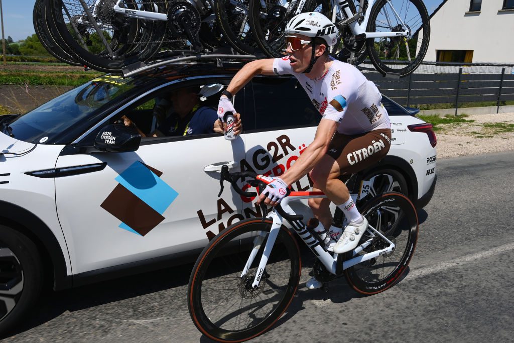109th Tour de France 2022 - Stage 4 CALAIS, FRANCE - JULY 05: Stan Dewulf of Belgium and AG2R Citröen Team picks bottles from the Team car during the 109th Tour de France 2022, Stage 4 a 171,5km stage from Dunkerque to Calais / #TDF2022 / #WorldTour / on July 05, 2022 in Calais, France. (Photo by Tim de Waele/Getty Images)
