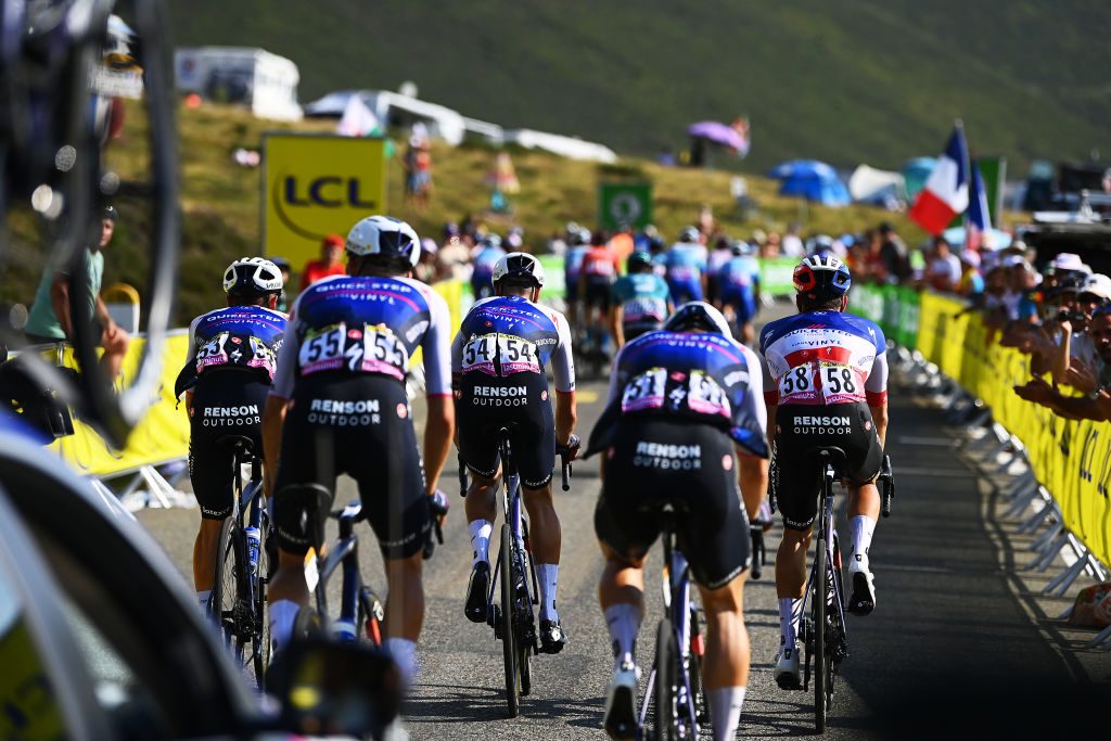 HAUTACAM, FRANCE - JULY 21: Fabio Jakobsen of Netherlands and Quick-Step - Alpha Vinyl Team helped by his teammates (Andrea Bagioli of Italy, Mikkel Honoré of Denmark, Mattia Cattaneo of Italy, Florian Senechal of France) in the final climb during the 109th Tour de France 2022, Stage 18 a 143,2km stage from Lourdes to Hautacam 1520m / #TDF2022 / #WorldTour / on July 21, 2022 in Hautacam, France. (Photo by Tim de Waele/Getty Images)