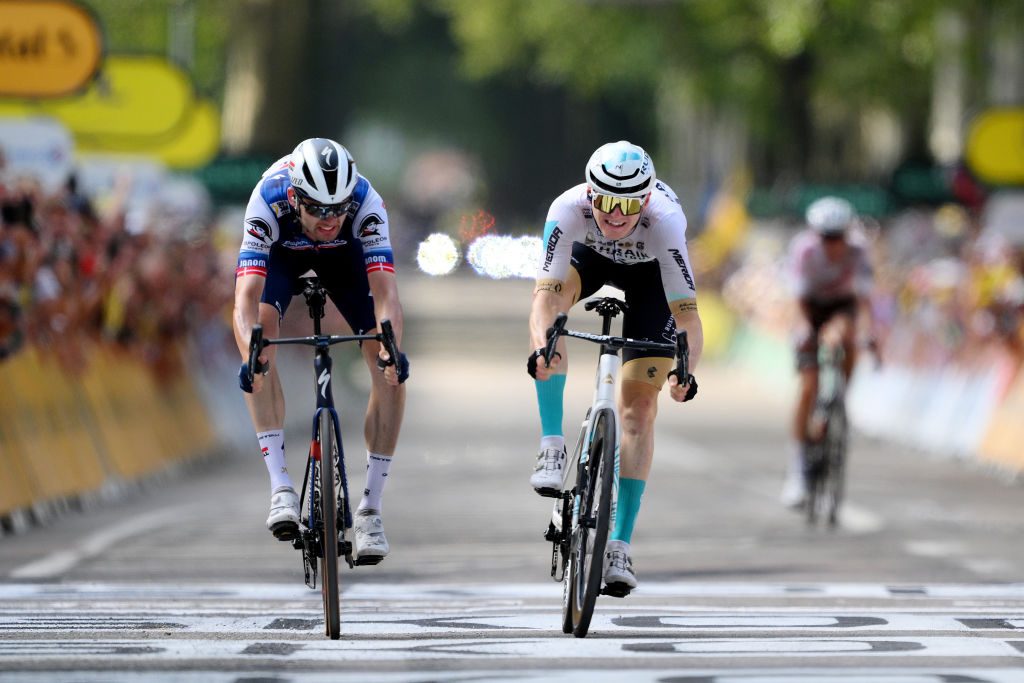 POLIGNY, FRANCE - JULY 21: (L-R) Kasper Asgreen of Denmark and Team Soudal - Quick Step and stage winner Matej Mohoric of Slovenia and Team Bahrain Victorious sprint at finish line during the stage nineteen of the 110th Tour de France 2023 a 172.8km stage from Moirans-en-Montagne to Poligny / #UCIWT / on July 21, 2023 in Poligny, France.