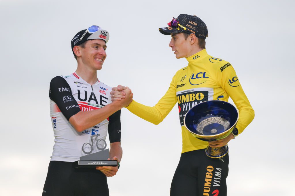 PARIS, FRANCE - JULY 23: (L-R) Tadej Pogacar of Slovenia and UAE Team Emirates on second place and race winner Jonas Vingegaard of Denmark and Team Jumbo-Visma - Yellow Leader Jersey pose on the podium ceremony after the stage twenty-one of the 110th Tour de France 2023 a 11 5.1km stage from Saint-Quentin-en-Yvelines to Paris / #UCIWT / on July 23, 2023 in Paris, France.