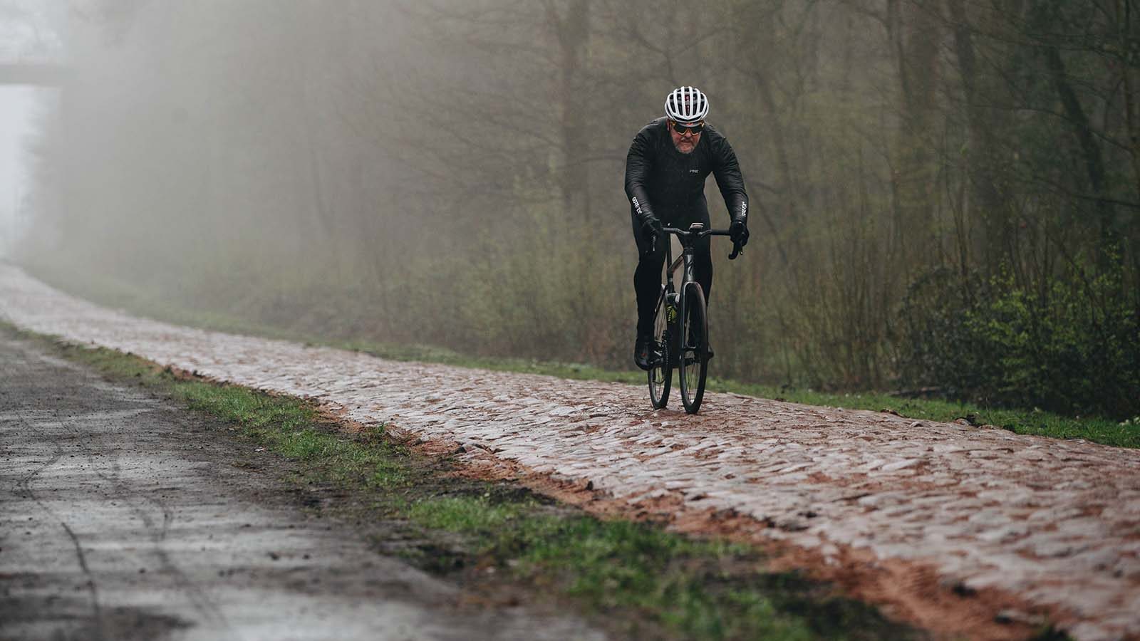 The Specialized Roubaix being ridden on coibbles by tech editor Warren Rossiter