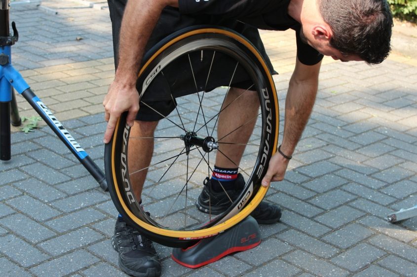 Mounting tubulars sticky with wet glue is not as easy as pro mechanics make it look