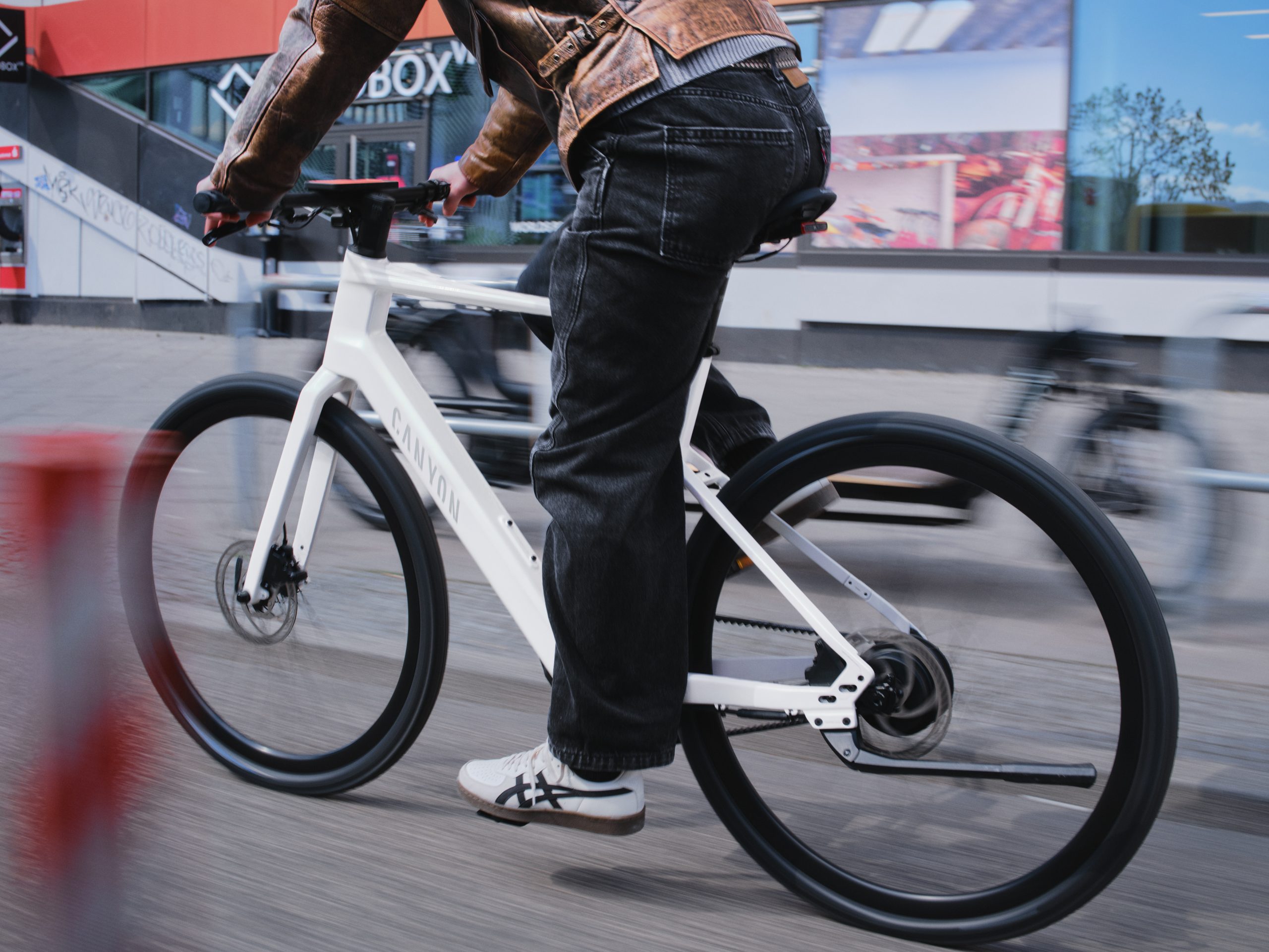 Person riding ebike with Bosch Hub Line motor.