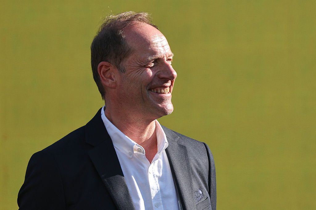 General director of the Tour de France Christian Prudhomme attends the team presentation ceremony ahead of the 113th edition of the Tour de France cycling race, with the Sagrada Familia Basilica seen in the background, in Barcelona, northeastern Spain, on July 2, 2026. (Photo by Anne-Christine POUJOULAT / AFP via Getty Images)