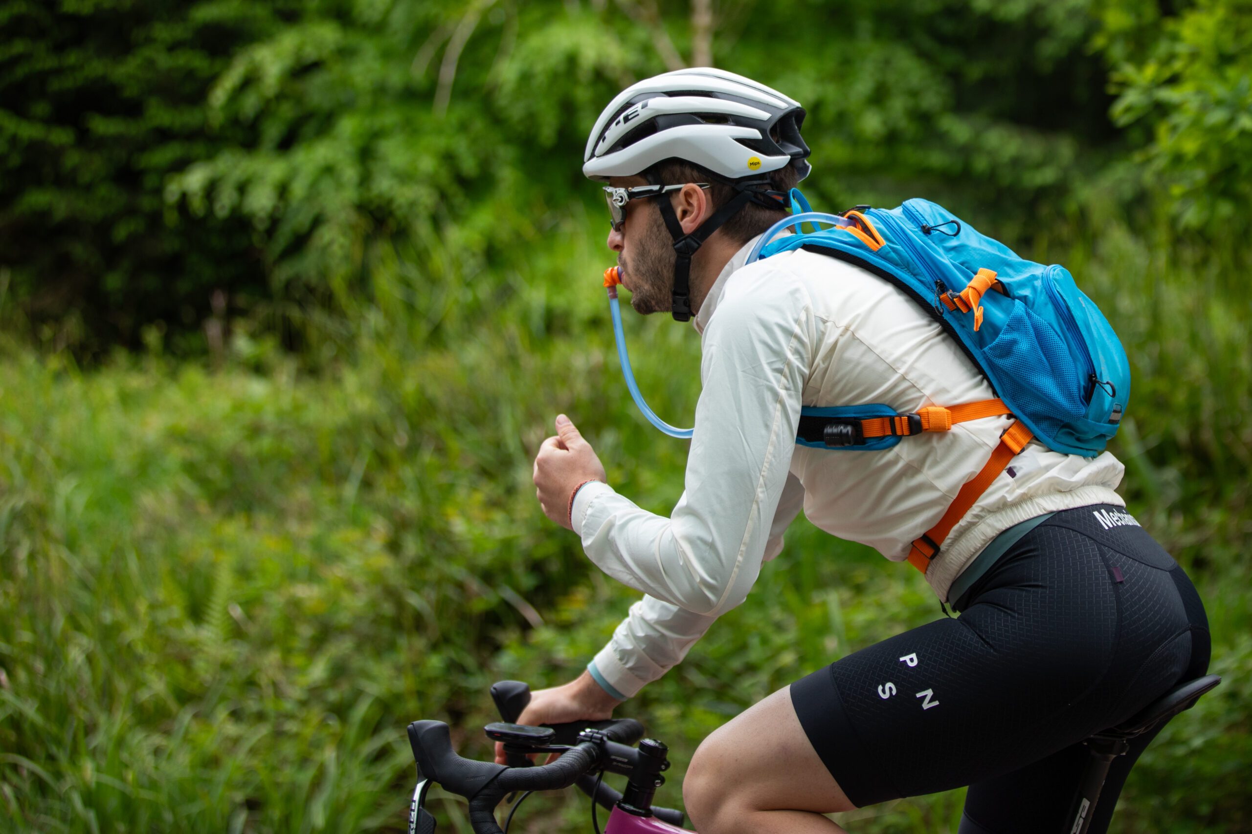 Liam Cahill drinking from hydration bladder nozzle on Lauf gravel bike