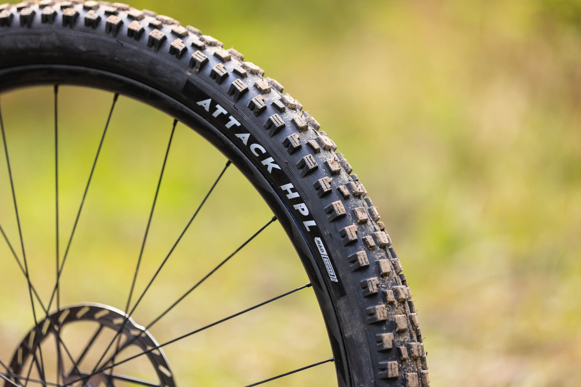Nutrak/Vee Attack HPL mountain bike tyre mounted on a wheel, showing the sidewall logo and tread blocks.