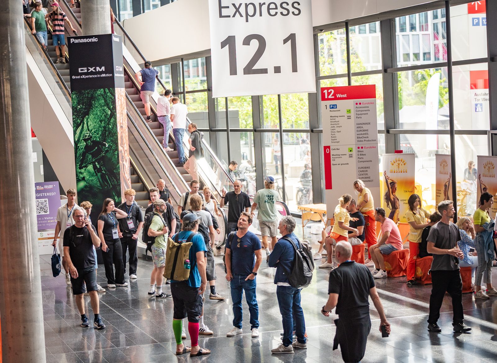 People walking around trade hall at Eurobike.