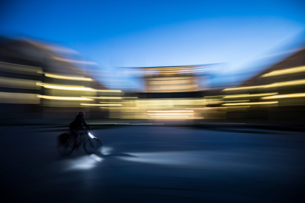 Exterior View Of The Federal Chancellery BERLIN, GERMANY - APRIL 25: A cyclist in front of the Federal Chancellery in the Blue Hour pictured on April 25, 2019 in Berlin, Germany. (Photo by Florian Gaertner/Photothek via Getty Images)